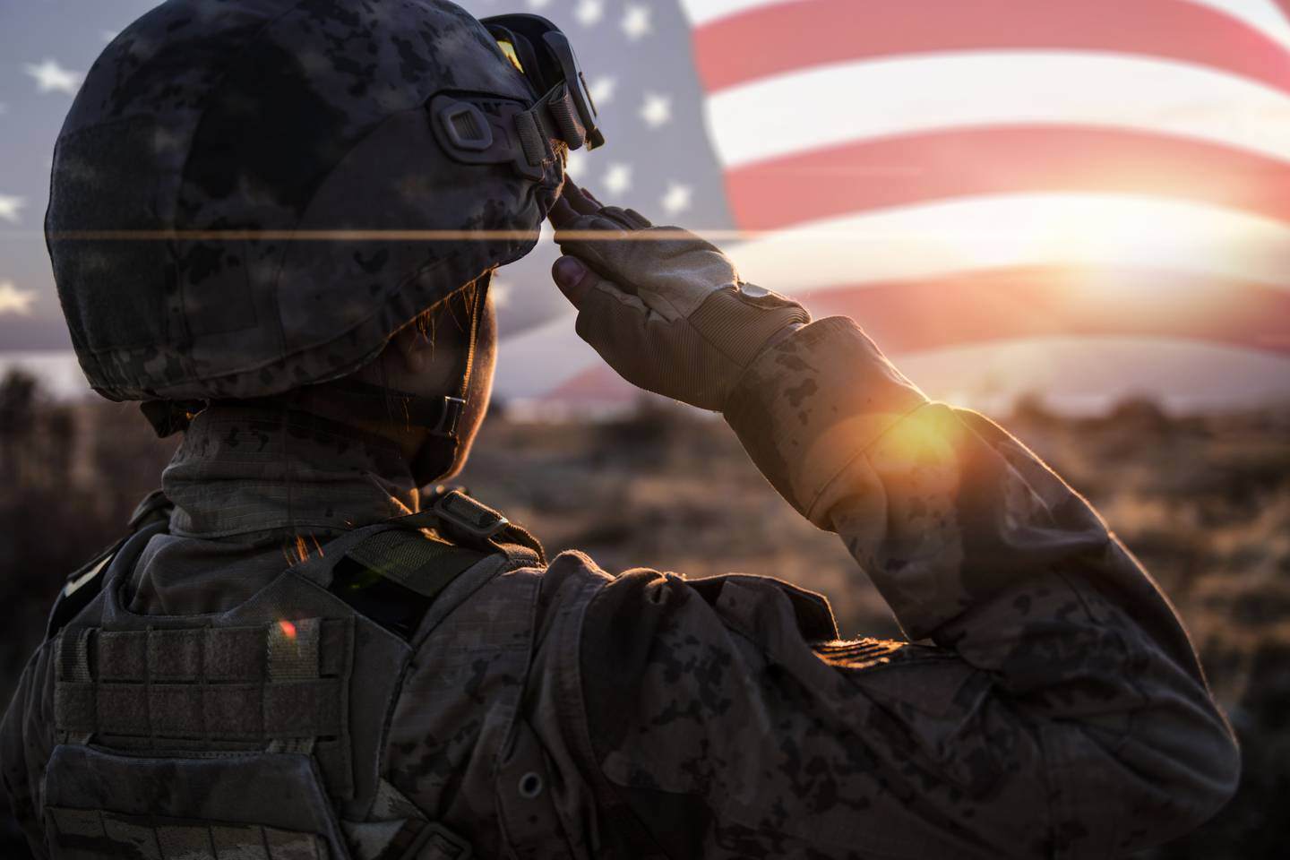 American Soldier saluting the American Flag